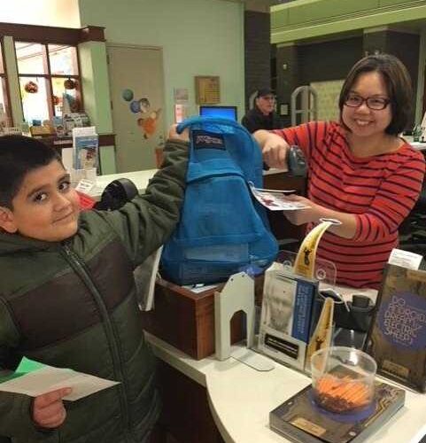 Boy taking home a kit. Boy taking home a kit.